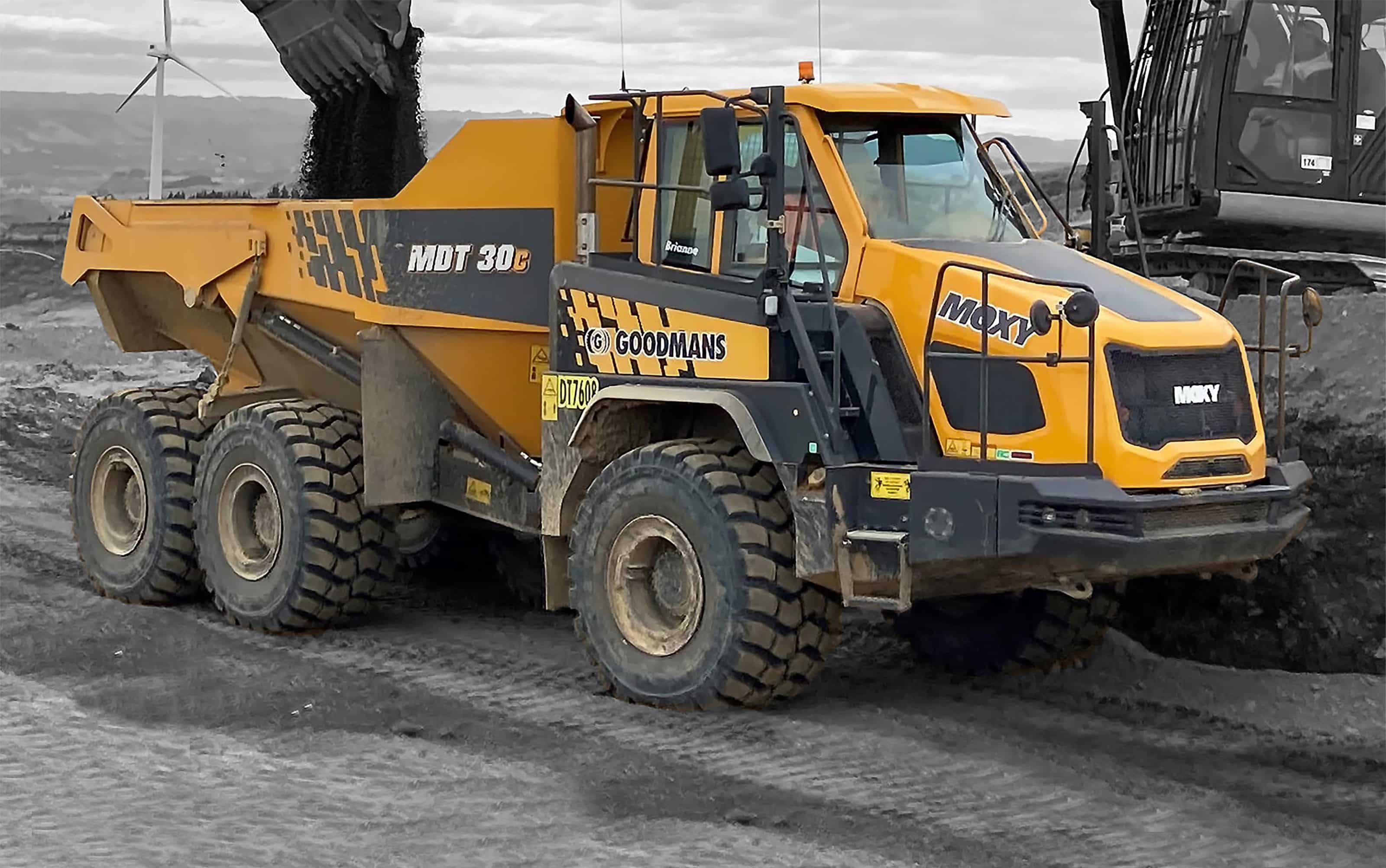 Moxy Articulated Dump Truck highlighted on grescale background