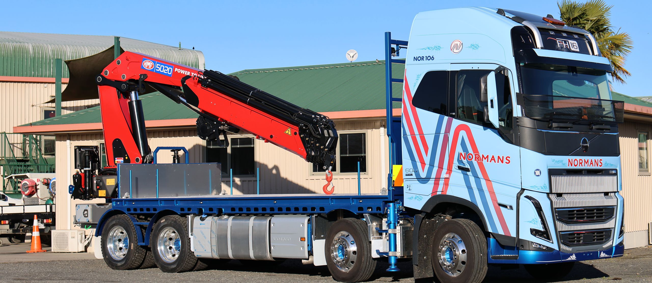 Normans Transport Volvo FH16 8x4 Globetrotter with HMF 5020 K6 crane and flat deck, built by MIMICO